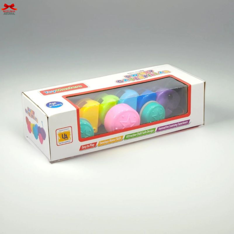 Box of colorful plastic eggs with a clear window on a gray background